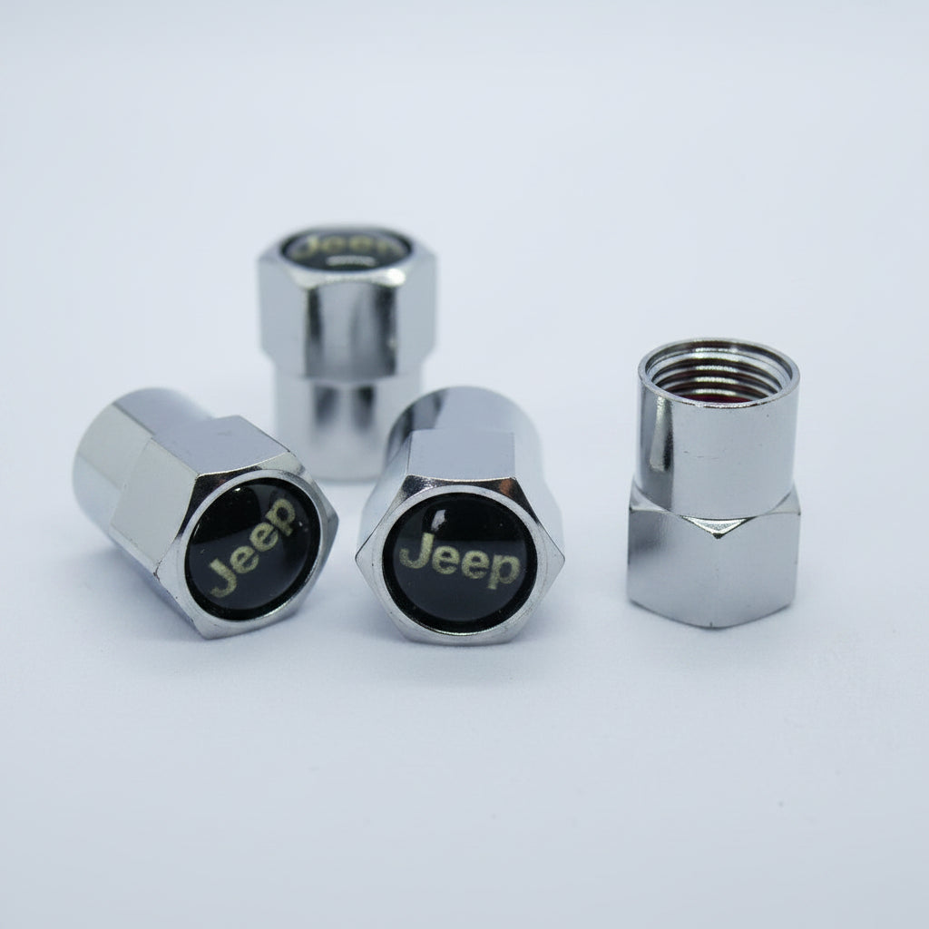 Chrome tire valve stem caps with Jeep logo on a light gray background